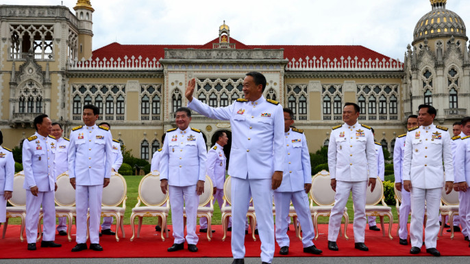 Thailand’s king swears in new PM and cabinet