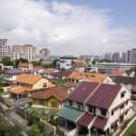 Private residential houses and Housing & Development Board (HDB) public housing estates in the Hougang area of Singapore in 2021. Photo: Bloomberg
