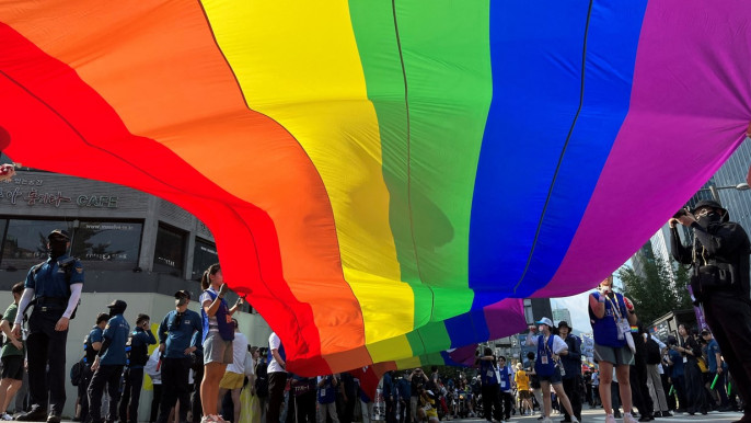 Seoul Queer Culture Festival participants hold a huge rainbow flag during parade in Seoul, South Korea, July 1, 2023. Photo: REUTERS/Minwoo Park/File Photo